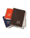 canvas fleece dog blanket in orange, brown, and blue